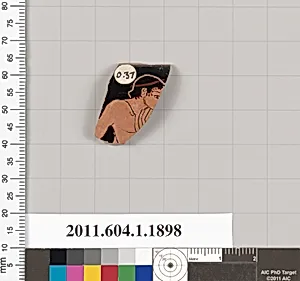 Terracotta rim fragment of a kylix (drinking cup)