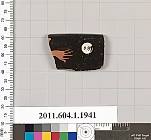 Terracotta rim fragment of a kylix (drinking cup)