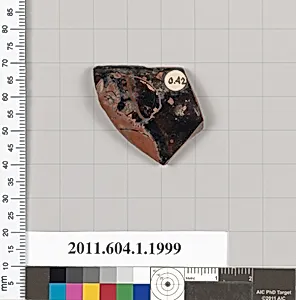 Terracotta rim fragment of a kylix (drinking cup)