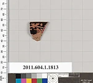 Terracotta rim fragment of a kylix (drinking cup)