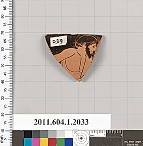 Terracotta rim fragment of a kylix (drinking cup)