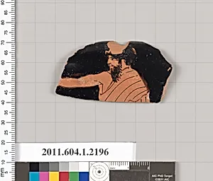 Terracotta rim fragment of a kylix (drinking cup)