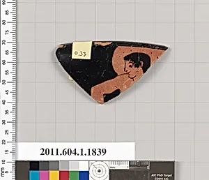 Terracotta rim fragment of a kylix (drinking cup)