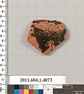 Terracotta rim fragment of a kylix (drinking cup)
