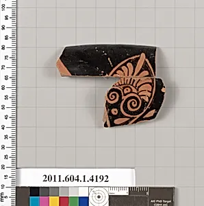 Terracotta rim fragment of a kylix (drinking cup)