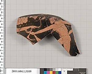 Terracotta rim fragment of a kylix (drinking cup)