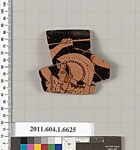 Terracotta rim fragment of a kylix (drinking cup)