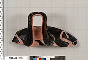 Terracotta rim fragment of a kylix (drinking cup)