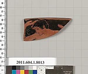 Terracotta rim fragment of a kylix (drinking cup)
