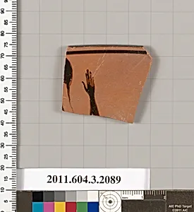 Terracotta rim fragment of a kylix (drinking cup)