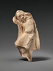 Terracotta statuette of a dancing youth