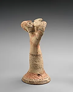 Terracotta statuette of a male flute-player