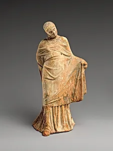 Terracotta statuette of a veiled dancer