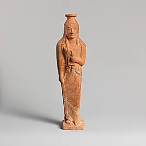 Terracotta vase in the form of a woman holding a bird