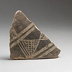 Terracotta vessel fragment with cross-hatched triangles and broad bands by Unknown Artist