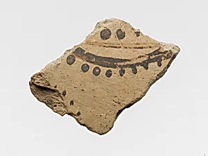 Terracotta vessel fragment with floral or marine motif by Unknown Artist