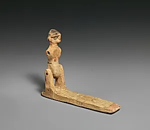 Toy in the form of a male(?) figure by Unknown Artist