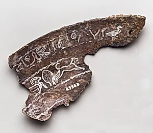 Two fragments of a silver bowl