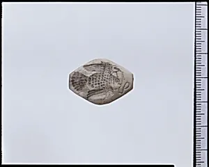 White stone engraved gem