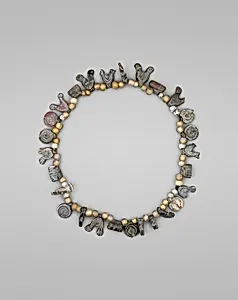 Necklace with Bird, Circle and Cylinder Beads
