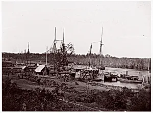 [Broadway Landing with Supply Boats, Appomattox River, Virginia] by William Frank Browne|Mathew B. Brady