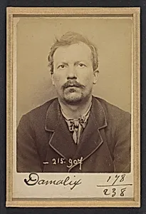 Damalix. Émile, Auguste. 37 ans, né à St-Claude (Doubs). Charpentier. Anarchiste. 19/3/94.  by Alphonse Bertillon