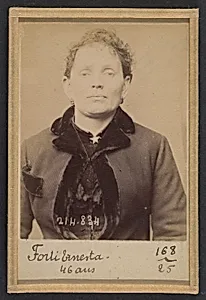 Forti. Ernesta. 45 (ou 46) ans, née à Lodi (Italie). Laitière. Anarchiste. 27/2/94. by Alphonse Bertillon
