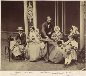 [Group Portrait of Five Adults and Two Children in a Garden]