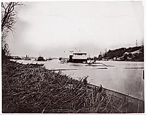 Ironclad fleet on James River below Rebel "Howlett House Battery" by Mathew B. Brady|Unknown