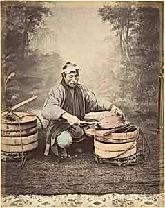 [Japanese Man Preparing a Fish]