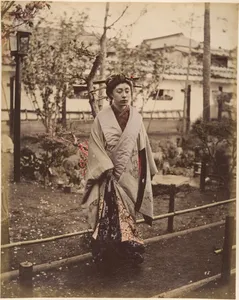 [Japanese Woman in Traditional Dress Posing Outdoors]