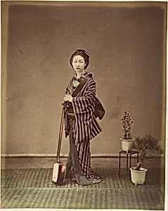 [Japanese Woman in Traditional Dress Posing with Instrument] by Unknown