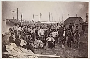 Laborers at Quartermaster's Wharf, Alexandria, Virginia by Mathew B. Brady|Andrew Joseph Russell