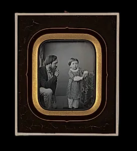 [Man Calming a Young Boy Posing before the Camera] by Unknown