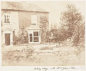 Oakley Cottage with Mr. St. John and Peter and Polly by John Dillwyn Llewelyn