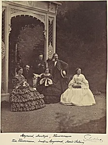 [Portrait of Three Women and Men in a Garden]