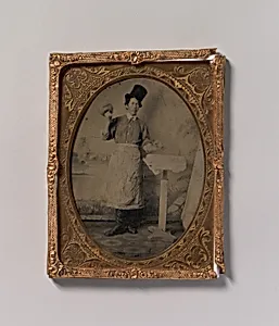 [Stone Mason in Top Hat and Apron with Mallet and Chisel] by Unknown