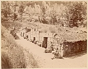 [Travelers By Ancient Monument] by Unknown