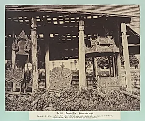 Tsagain Myo: Litters under a shed. by Linnaeus Tripe