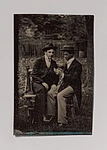 [Two Men Seated on a Bench, One with His Hand on the Leg of the Other] by Unknown