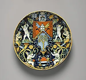 Bowl with the Arms of Pope Julius II and the Manzoli of Bologna surrounded by putti, cornucopiae, satyrs, dolphins, birds, etc. by workshop of Giovanni Maria Vasaro