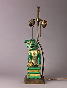 Figure of lion mounted as lamp