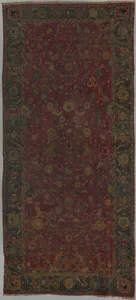 Indo-Persian carpet with vine scroll and palmette pattern
