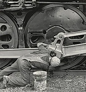 604 478, Man Working on Driving Wheels, Former Milwaukee Railroad Locomotive Number 261, Chicago, Illinois