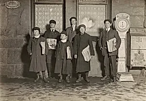 8:30 P.M. Group of newsboys selling at the depot, Hartford, Connecticut. Smallest boy 11 years old.