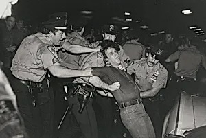 A demonstrator refused to stop blocking traffic. The police removed him bodily, New York City
