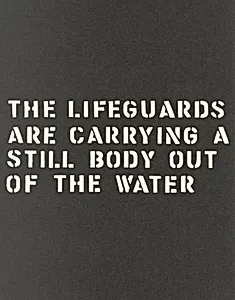 A Performance:The Lifeguards Are Carrying a Still Body Out of the Water