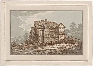 A Rustic House with a Tottering Wood Fence