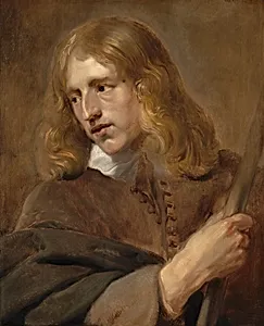 A Young Man Holding a Staff