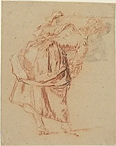 A Young Woman Looking in a Mirror